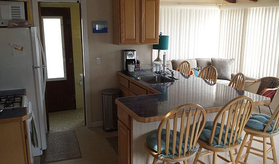 Kitchen with sun room couch