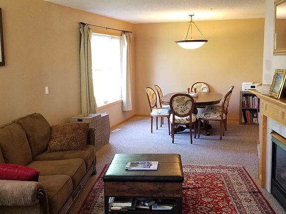 Open floor plan with many large windows