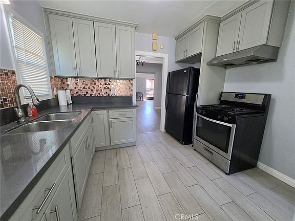 5th image of 8939 Guess St
