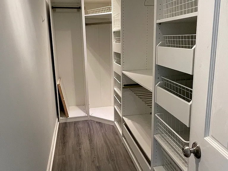 Large walk-in closet with plenty of storage for easy organization!