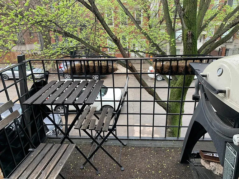 Private front balcony perfect for morning coffee, relaxing, or grilling.
