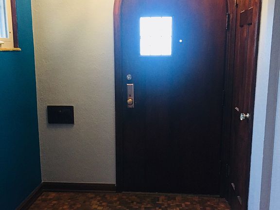 Front entry w/mail slot.