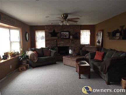 Spacious livingroom with wood burning fireplace!