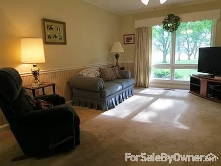 Family Room
						:
						Cozy family room with sunset views through the pecan orchard