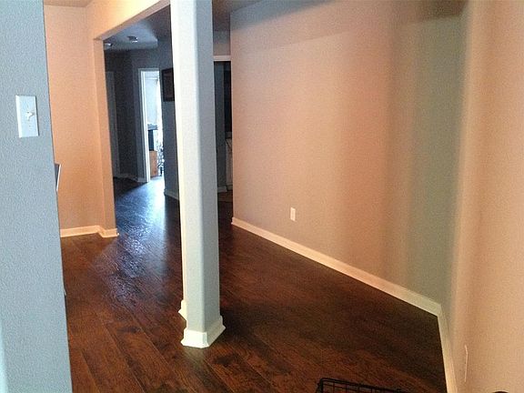 There is a long hallway from the entrance that leads to the