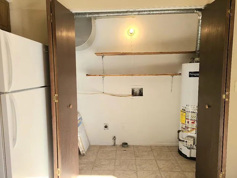 Utility area for washer/dryer