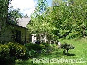 Back of house : with stone patio