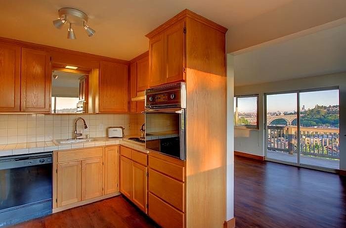 Kitchen opens to living s