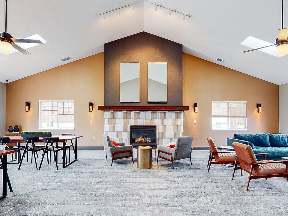 Warm tones, natural light, and cozy seating make our clubhouse the perfect place to gather, work, or simply unwind by the fire.