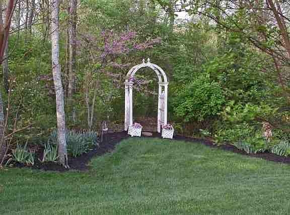 Arbor Leading to Private Wooded Trail