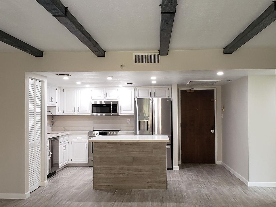 Open Floor Plan with Rustic Beams