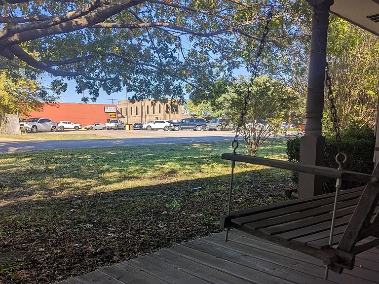 Front porch swing with Old Downtown Square straight across the road