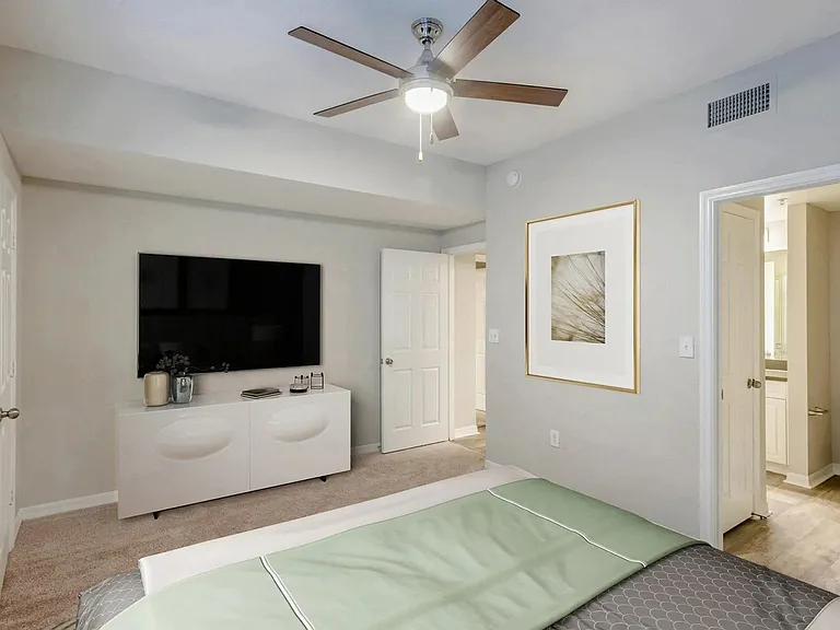 Ceiling fans in bedroom and living room.