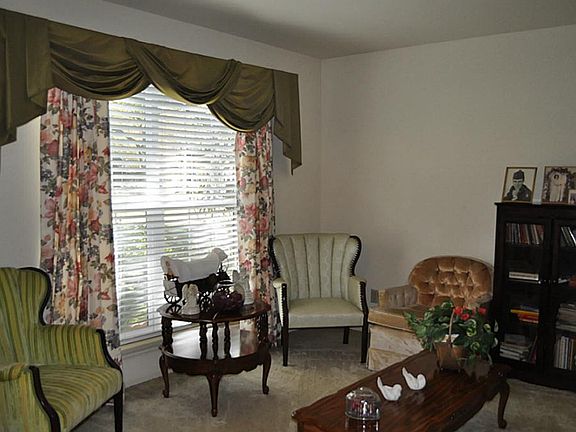 Front Room currently used as a Formal Den, would be great for a Study as well.