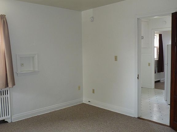Living Room, 3rd view. New paint & carpet!