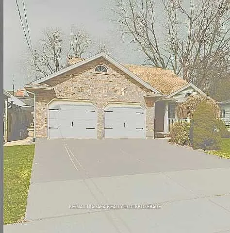 7731 Mulhern St — Photo 1