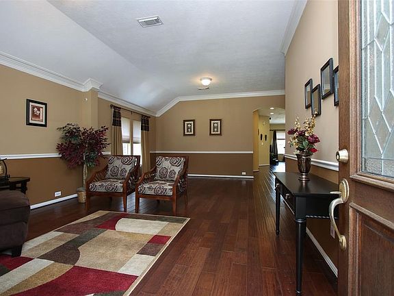 Your guests will be impressed by this well appointed formal living/dining area as they enter your home.