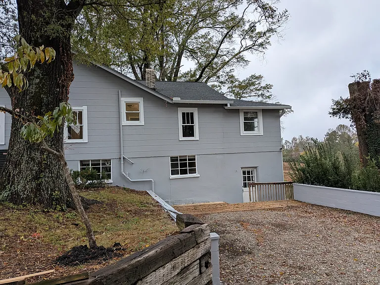 Door on lower level on right - totally seperate and not connected to house upstairs