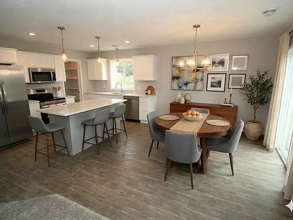 Kitchen and dining virtually staged