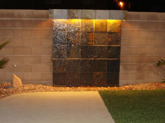 Custom water wall in private yard