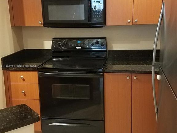 3rd image of 3450 Pinewalk Dr N APT 418