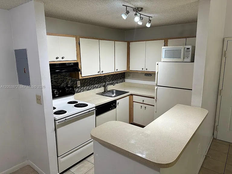 7200 NW 179th St #311 — Photo 3