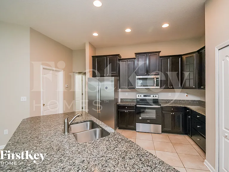 1044 Mayfair Creek Ct — Photo 7