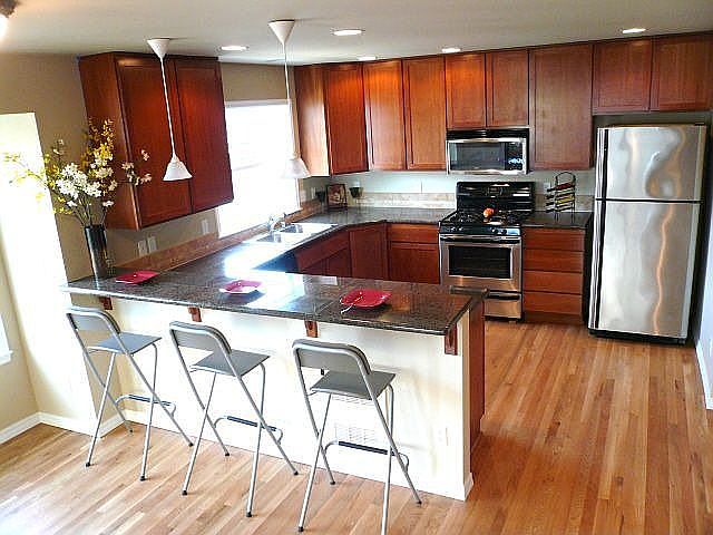 Natural cherry cabinets, granite countertops, stainless appliances