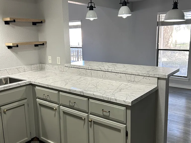Open shelving, large sink with disposal. Oh and though you maybe in the kitchen you have a great view of the outside space.