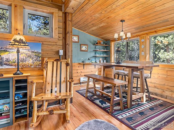 Cozy dining area and large picture windows, when open the sounds of the river below is amazing!!