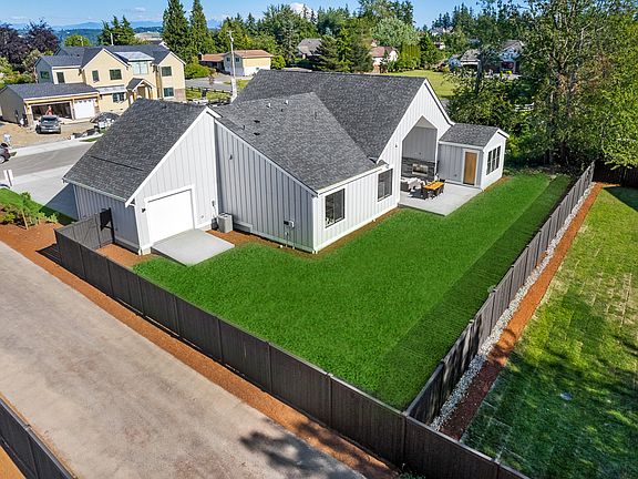 Fenced and landscaped backyard