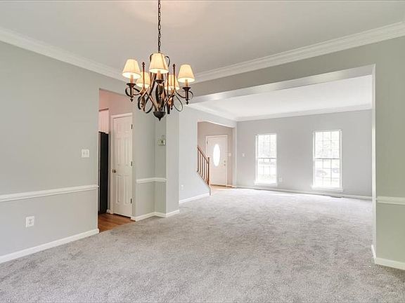 The Formal Dining and Living Rooms