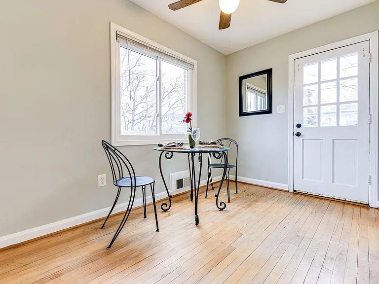 Hardwood floors now stained a darker color