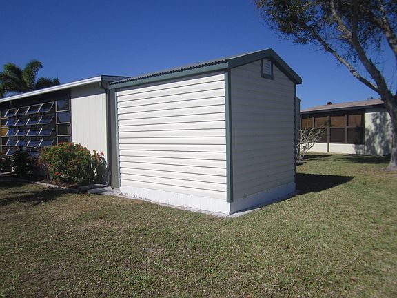 small shed w/adjacent shed 