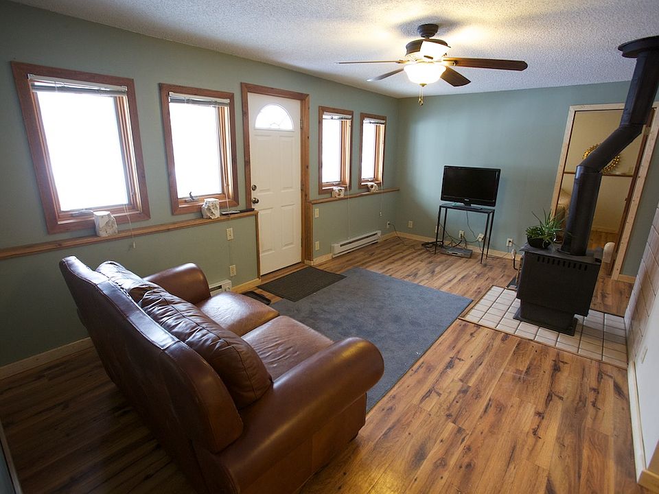 Living Room with views of our private meadow leading to Monte Cristo Creek.