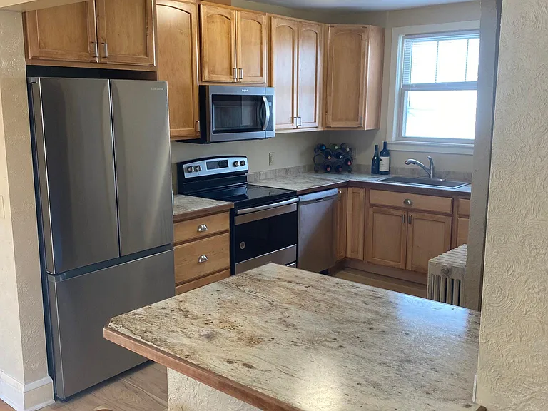 Kitchen has lots of storage.