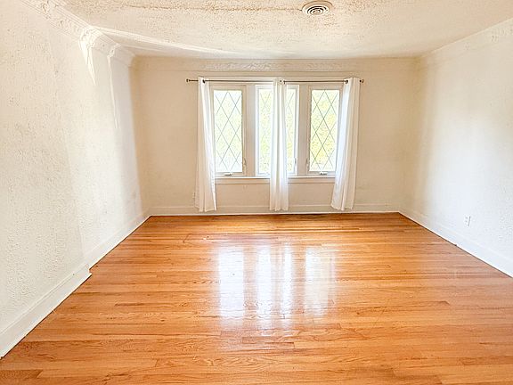 Living/Family room (front of house, overlooking street)