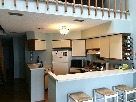 Kitchen opens up to the living room.