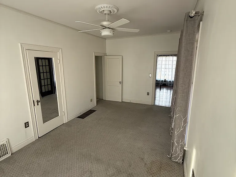 Master bedroom view towards living room and hallway