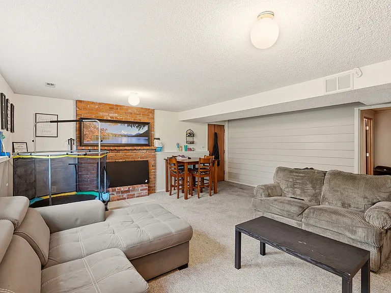 lower level rec room is large with very wide window