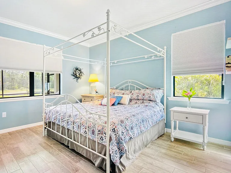 Master bedroom with water/preserve views. New Tempurpedic king mattress, 2 nightstands and bureau