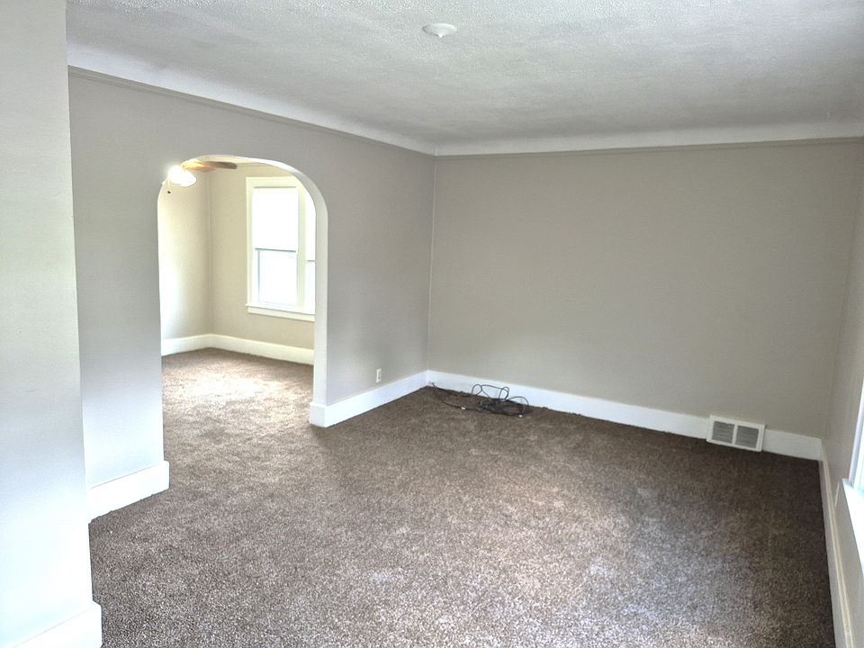 Open arch from Living room to Formal Dining room.