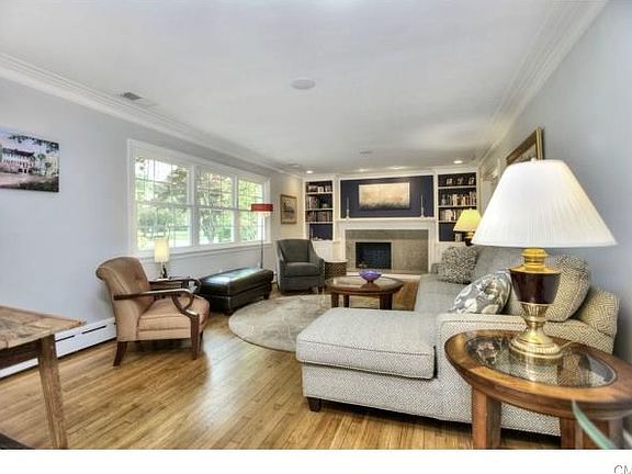 Oversized living room with eye catching fireplace.