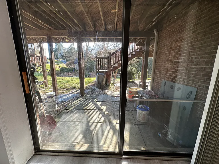 Sliding glass door gives rental space private entrance.