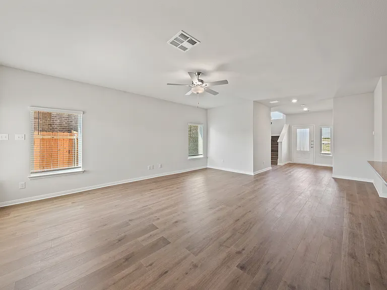 The family room is spacious enough to fit lots of furniture so everyone has a seat.