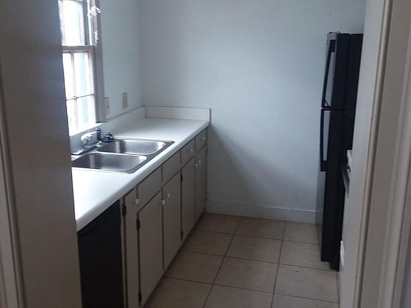 Kitchen with tiled floor