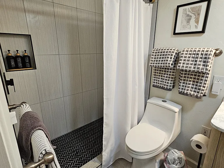 Hall bathroom is adjacent to the second bedroom. Recently remodeled. Walk-in shower, luxury towels; amenities (shampoo, conditioner and body wash) and blow dryer in both bathrooms.