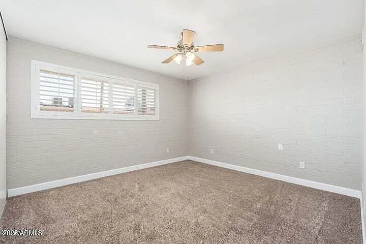 4848 N Woodmere Fairway #5 — Photo 6