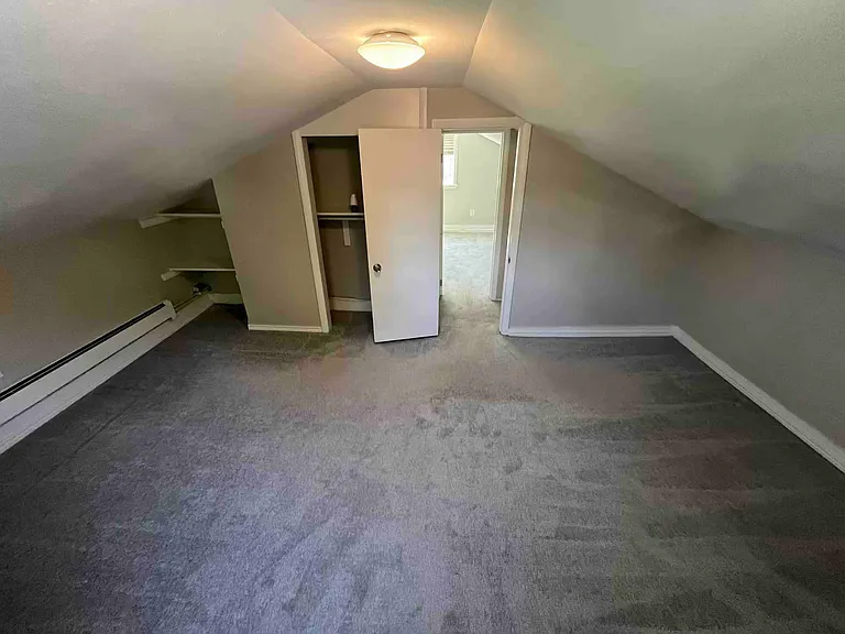 Bedrooms have non-conforming ceiling; ~6' in center sloping to ~3' at wall