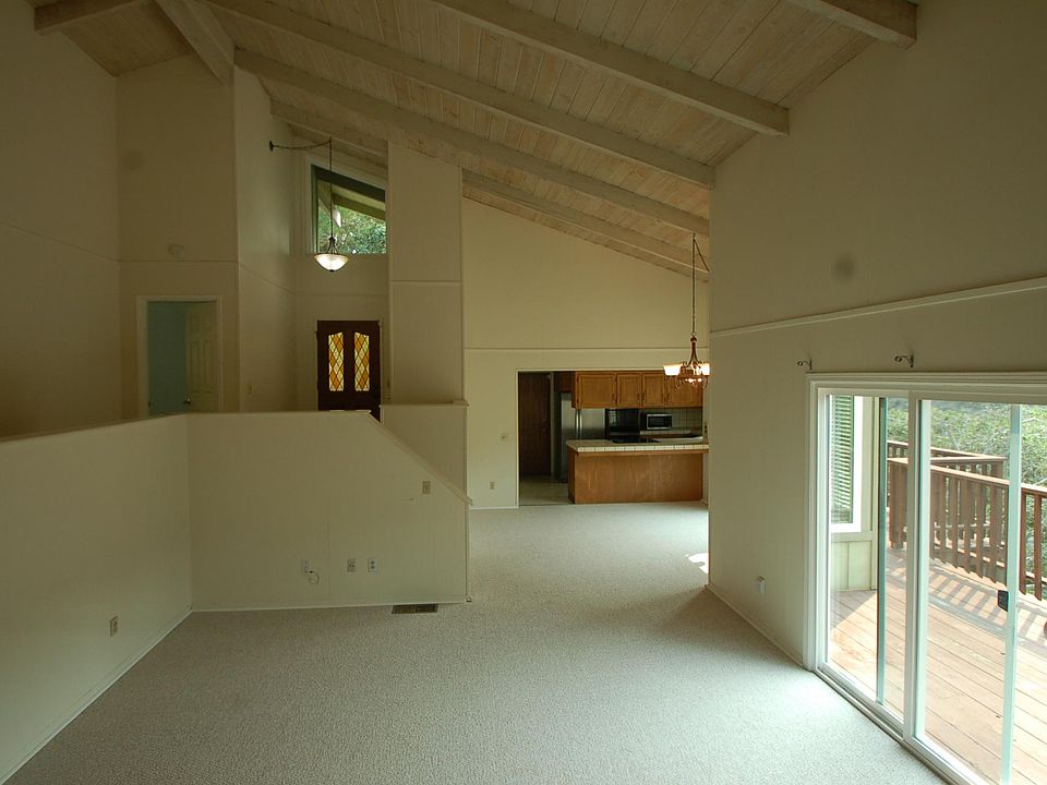 Front entry to livingroom, dinning room and kitchen. 2 slider doors from the dining room and livingroom to the deck.